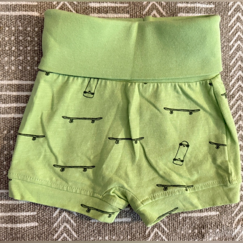 kate quinn Mint Baby Onesie with Dachshund Graphic